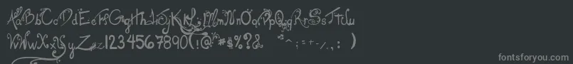 LesOeufsDeCassowary Font – Gray Fonts on Black Background