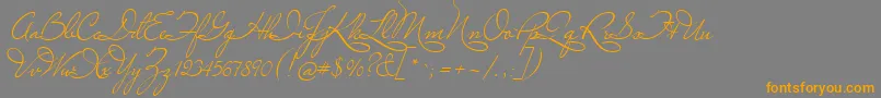 MissLeGatees-Schriftart – Orangefarbene Schriften auf grauem Hintergrund