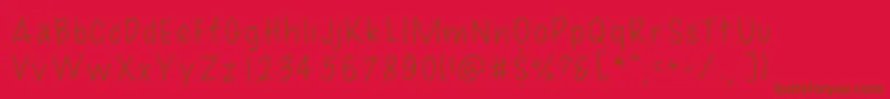Uno Font – Brown Fonts on Red Background