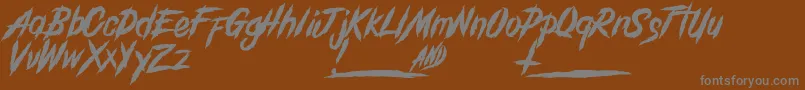 フォントGrindanddeathDemo – 茶色の背景に灰色の文字