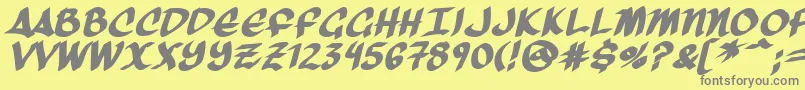 フォントThreeArrowsBold – 黄色の背景に灰色の文字