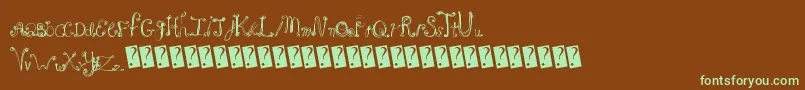 フォントFrenchsugar – 緑色の文字が茶色の背景にあります。