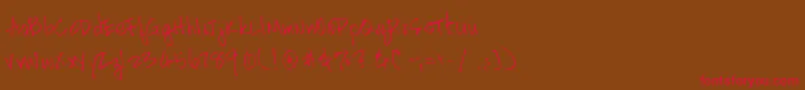 HandscriptleftyRegular-fontti – punaiset fontit ruskealla taustalla