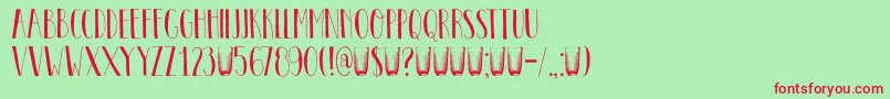 DkPastis-Schriftart – Rote Schriften auf grünem Hintergrund
