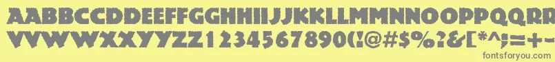 フォントRockstone – 黄色の背景に灰色の文字