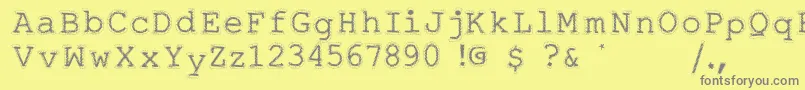 フォントSkontt – 黄色の背景に灰色の文字