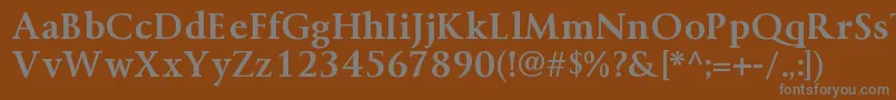 ByingtonrgBold-fontti – harmaat kirjasimet ruskealla taustalla
