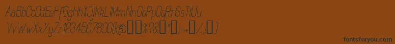 Czcionka Rogai – czarne czcionki na brązowym tle