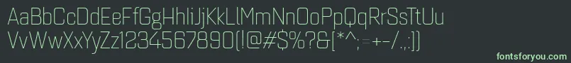 フォントQuarcanormlight – 黒い背景に緑の文字