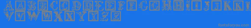 Corrodetinitials-Schriftart – Graue Schriften auf blauem Hintergrund