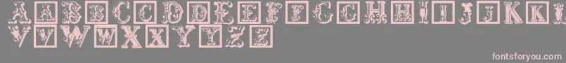 フォントCorrodetinitials – 灰色の背景にピンクのフォント