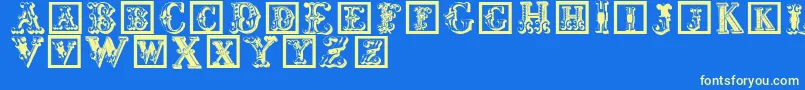 フォントCorrodetinitials – 黄色の文字、青い背景
