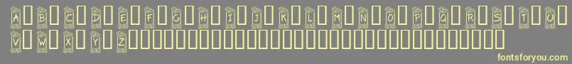 Шрифт KrFlowerFrame – жёлтые шрифты на сером фоне
