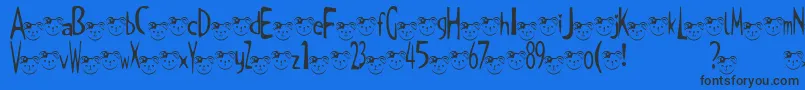 TKuma2Font Font – Black Fonts on Blue Background