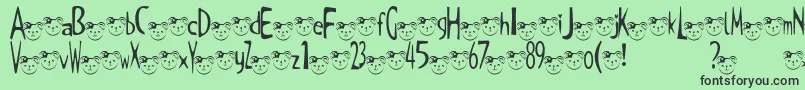 TKuma2Font Font – Black Fonts on Green Background