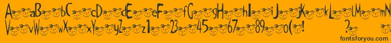 TKuma2Font Font – Black Fonts on Orange Background