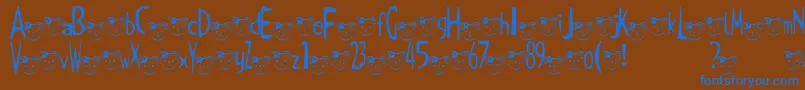TKuma2Font Font – Blue Fonts on Brown Background