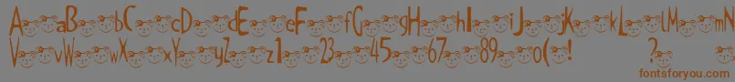 TKuma2Font Font – Brown Fonts on Gray Background