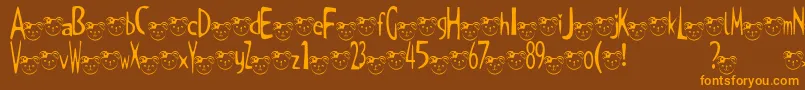 TKuma2Font Font – Orange Fonts on Brown Background
