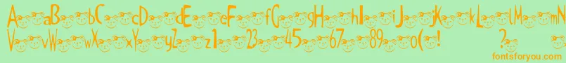 TKuma2Font Font – Orange Fonts on Green Background