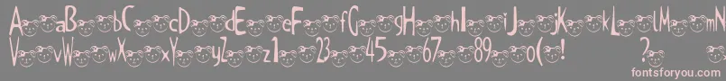 フォントTKuma2Font – 灰色の背景にピンクのフォント