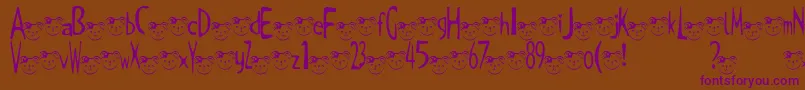 TKuma2Font Font – Purple Fonts on Brown Background