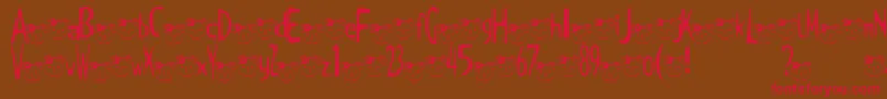 TKuma2Font-Schriftart – Rote Schriften auf braunem Hintergrund