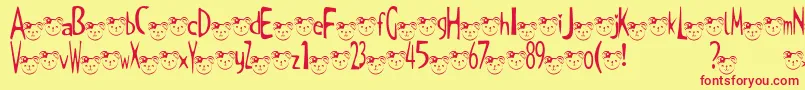 TKuma2Font-Schriftart – Rote Schriften auf gelbem Hintergrund