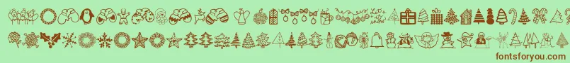 Fonte Austiebostchristmasdoodles – fontes marrons em um fundo verde