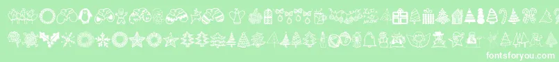 Fonte Austiebostchristmasdoodles – fontes brancas em um fundo verde