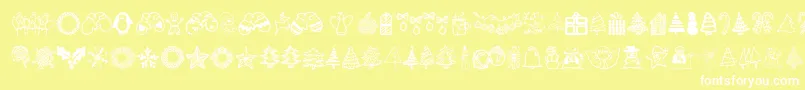 Fonte Austiebostchristmasdoodles – fontes brancas em um fundo amarelo