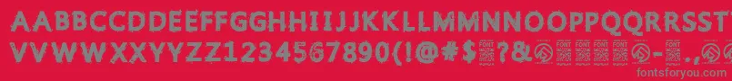 フォントGristledfontRegular – 赤い背景に灰色の文字