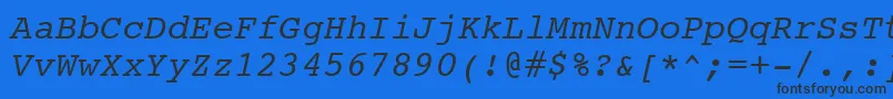 Шрифт CourierItalicSwa – чёрные шрифты на синем фоне