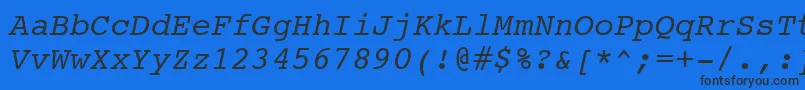 Czcionka CourierItalicSwa – czarne czcionki na niebieskim tle