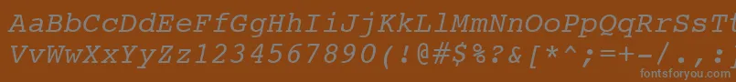 Czcionka CourierItalicSwa – szare czcionki na brązowym tle