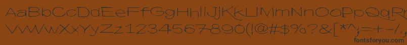 Шрифт HyvaVoittaaPahan60 – чёрные шрифты на коричневом фоне