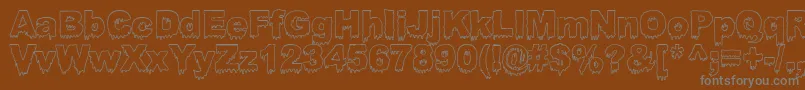 Bloosg Font – Gray Fonts on Brown Background