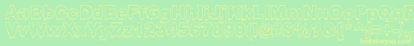 Bloosg Font – Yellow Fonts on Green Background