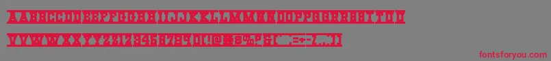 Westernraiexpand-Schriftart – Rote Schriften auf grauem Hintergrund