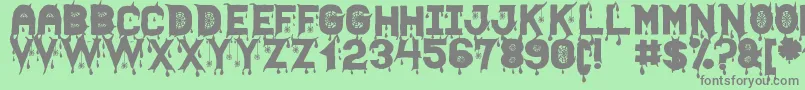 HallowenScareSt Font – Gray Fonts on Green Background