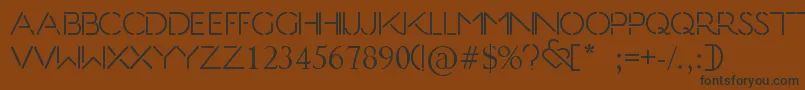 KissTell Font – Black Fonts on Brown Background