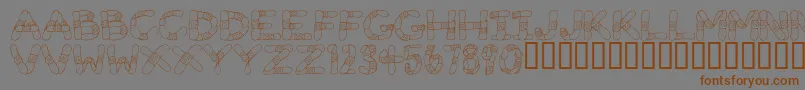 Weitere Informationen zur GauzeStrips-Schriftart GauzeStrips-Schriftart – Braune Schriften auf grauem Hintergrund