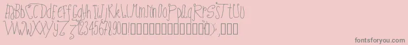 Pwfairytales-fontti – harmaat kirjasimet vaaleanpunaisella taustalla