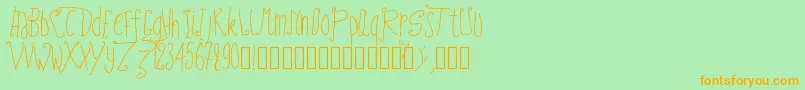 フォントPwfairytales – オレンジの文字が緑の背景にあります。