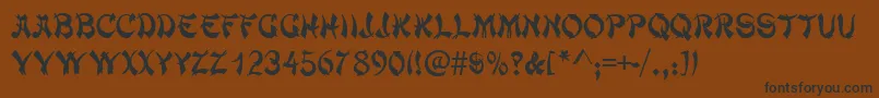 TaipancapssskRegular Font – Black Fonts on Brown Background