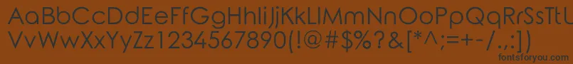 RoundedElegance Font – Black Fonts on Brown Background