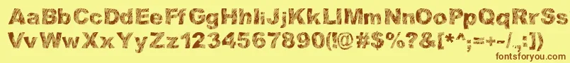 StrippinDirty Font – Brown Fonts on Yellow Background