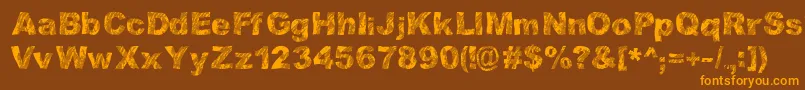 StrippinDirty Font – Orange Fonts on Brown Background