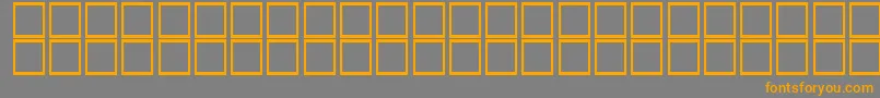 フォントKufiItalic – オレンジの文字は灰色の背景にあります。