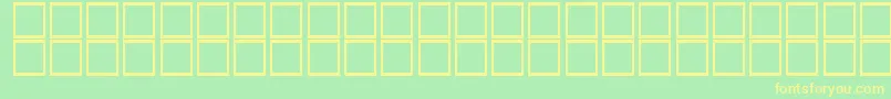 KufiItalic-Schriftart – Gelbe Schriften auf grünem Hintergrund